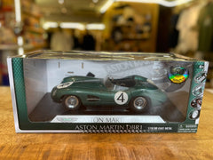 Aston Martin DBR1 1:18 model car, hand signed by British racing driver Stirling Moss