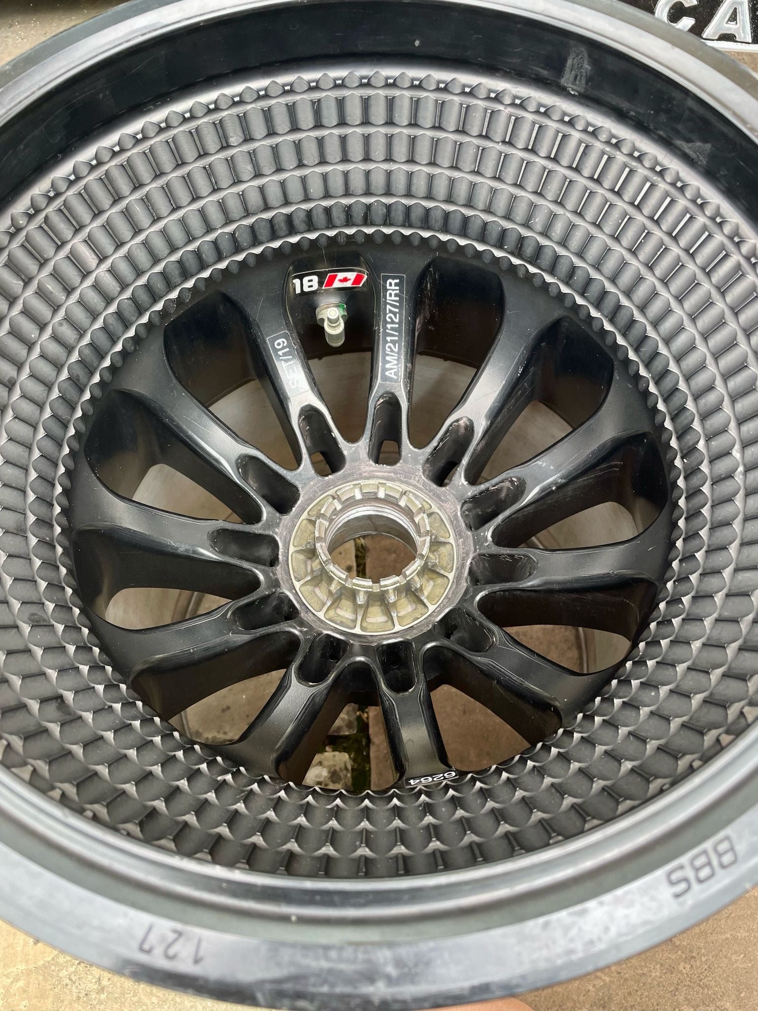 Genuine Aston Martin F1 Wheel Coffee Table - The Man Cave Broadway