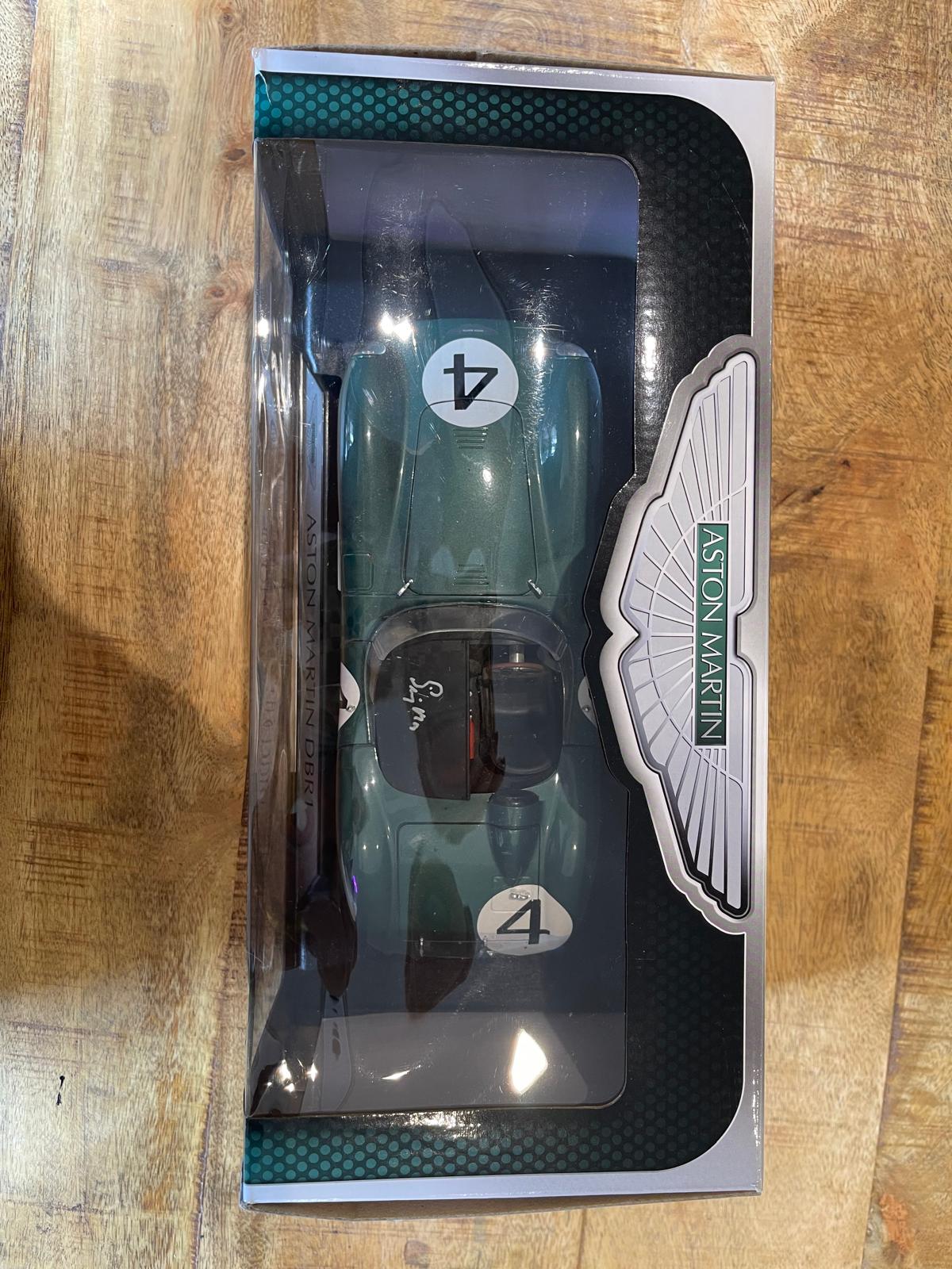 Aston Martin DBR1 1:18 model car, hand signed by British racing driver Stirling Moss - The Man Cave Broadway
