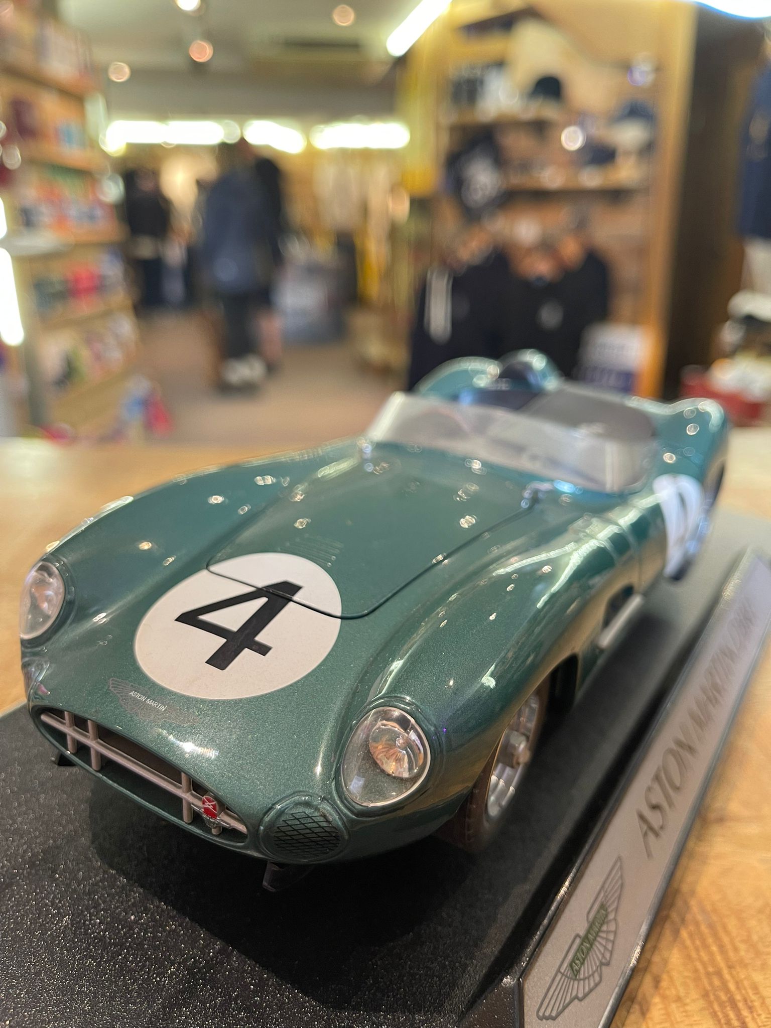 Aston Martin DBR1 1:18 model car, hand signed by British racing driver Stirling Moss - The Man Cave Broadway