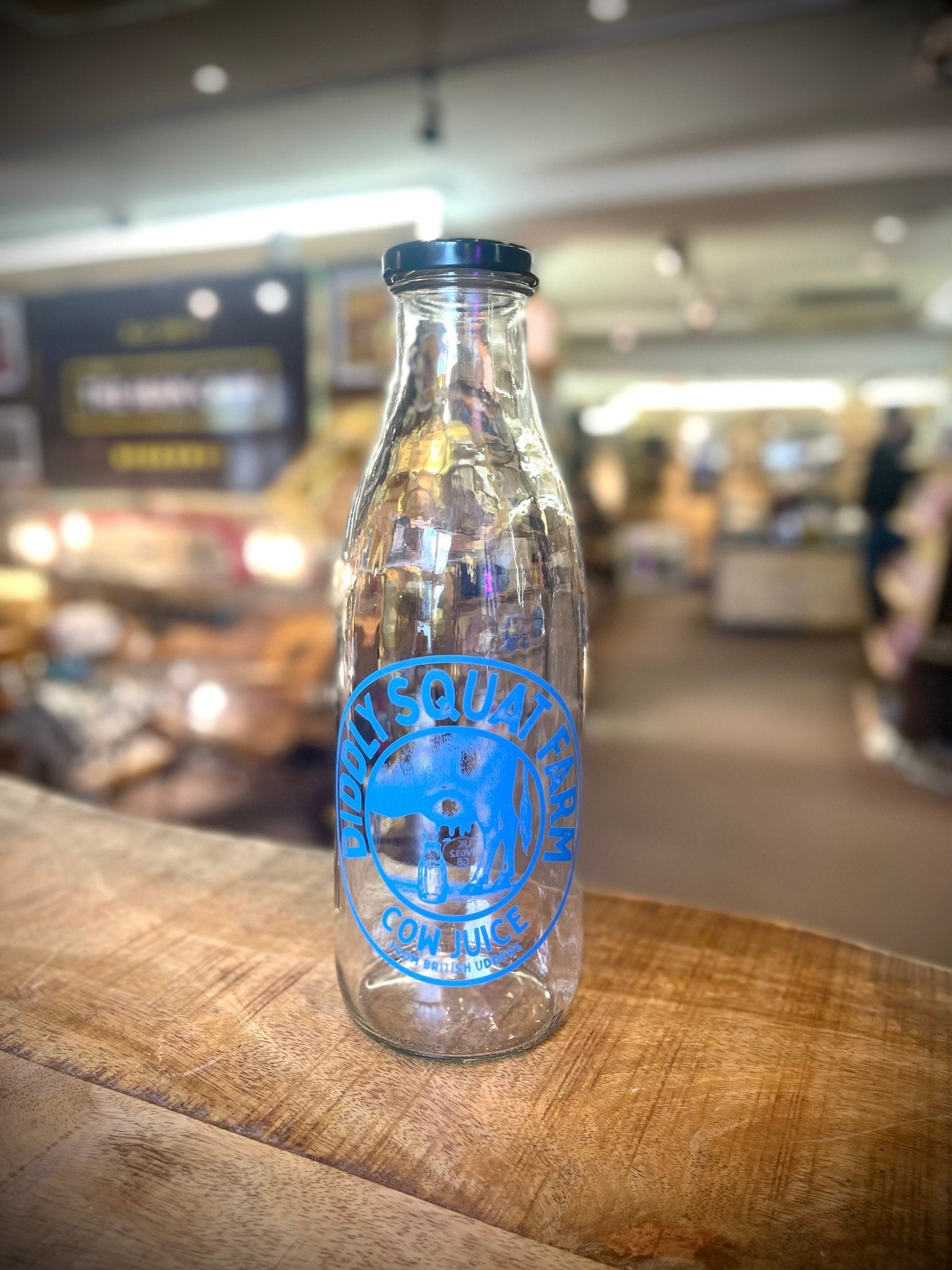DIDDLY SQUAT COW JUICE BOTTLE CLARKSON FARM / JEREMYS FAMOUS COW JUICE BOTTLE (Empty)NEW DESIGN! - The Man Cave Broadway