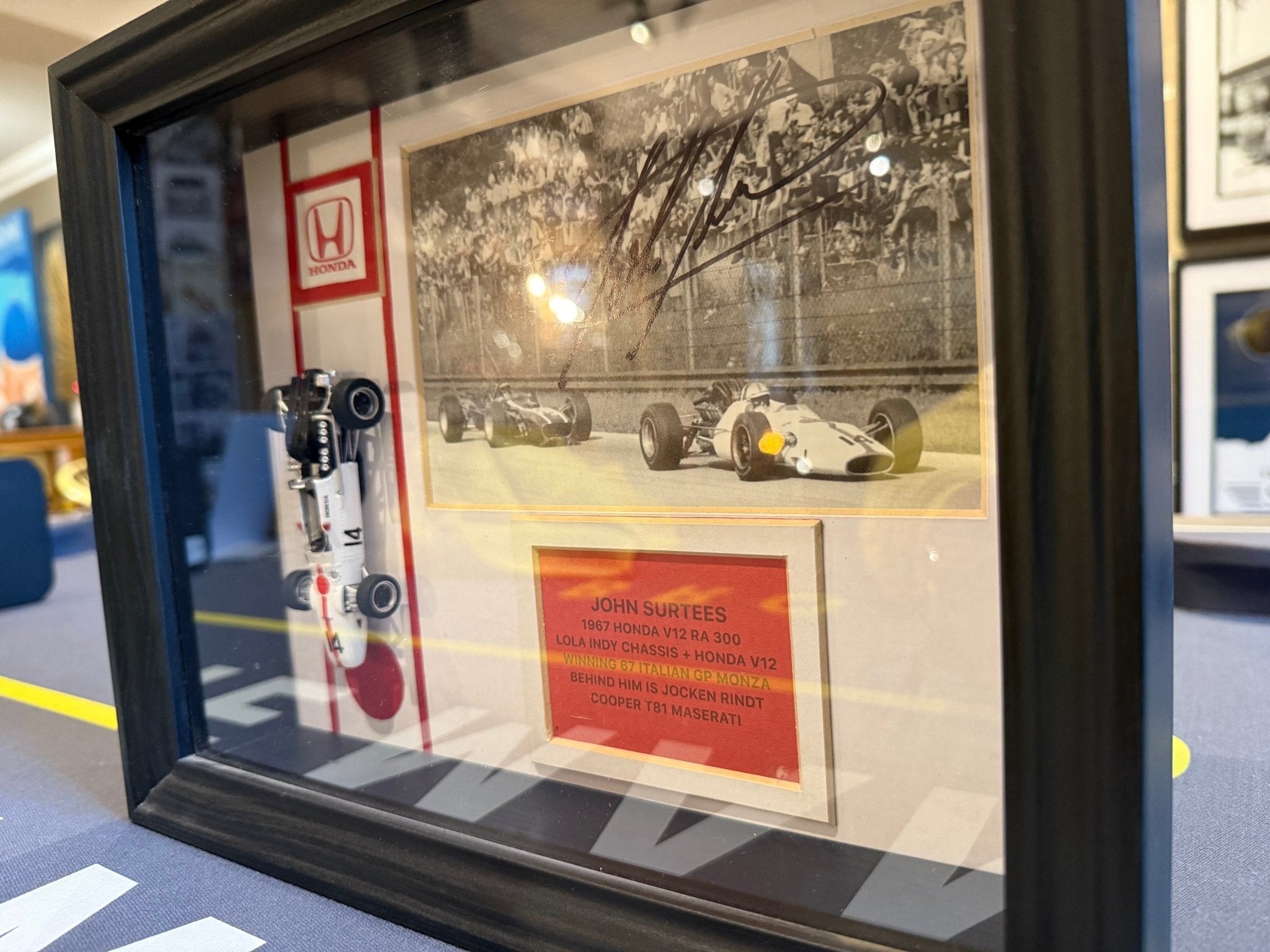 John Surtees Signed 1967 Honda Lola Indy V12 1:24 Scale Display Piece - The Man Cave Broadway