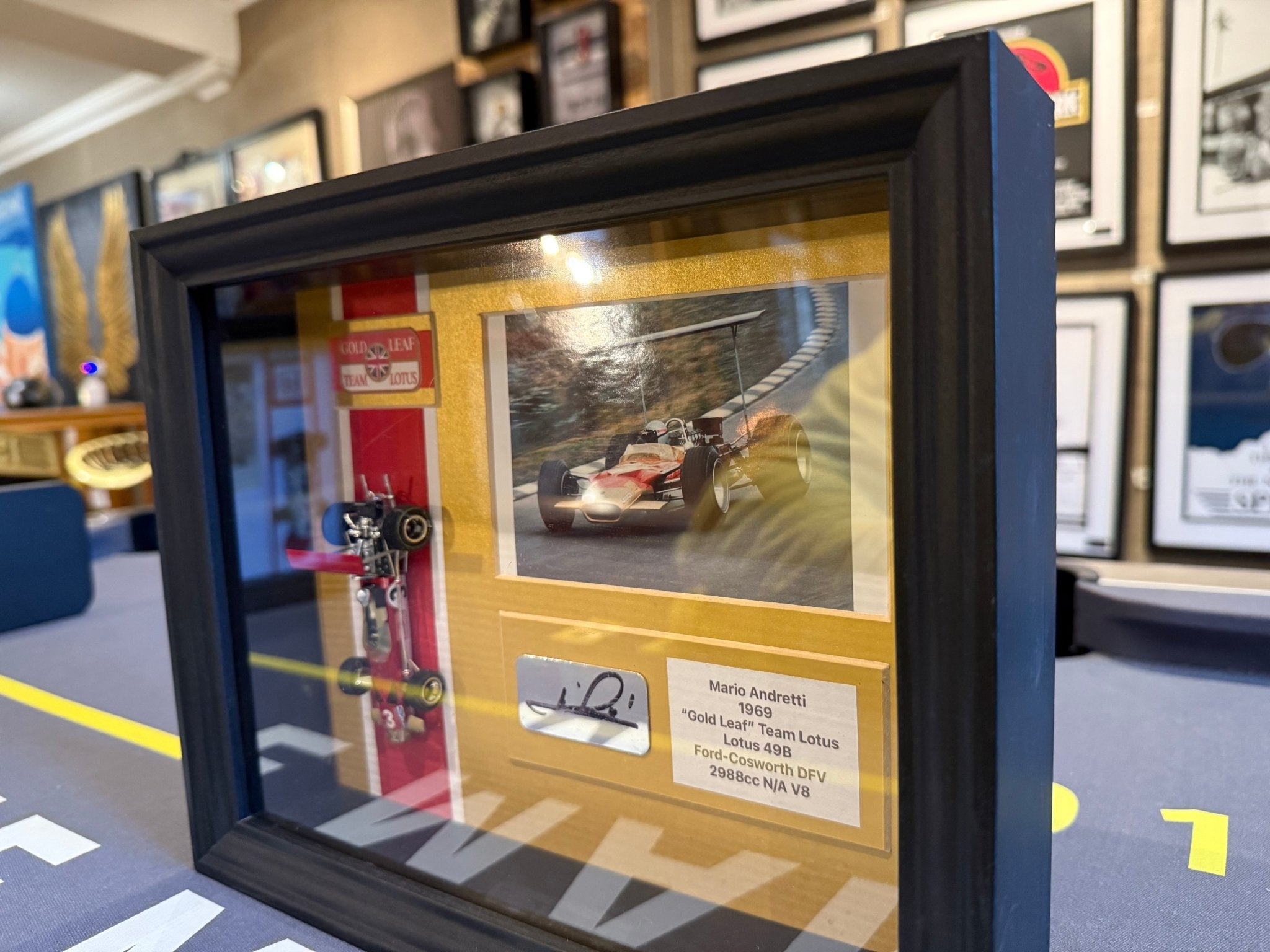 Mario Andretti Signed 1969 Lotus 49B ‘Gold Leaf’ 1:24 Race Car Display - The Man Cave Broadway