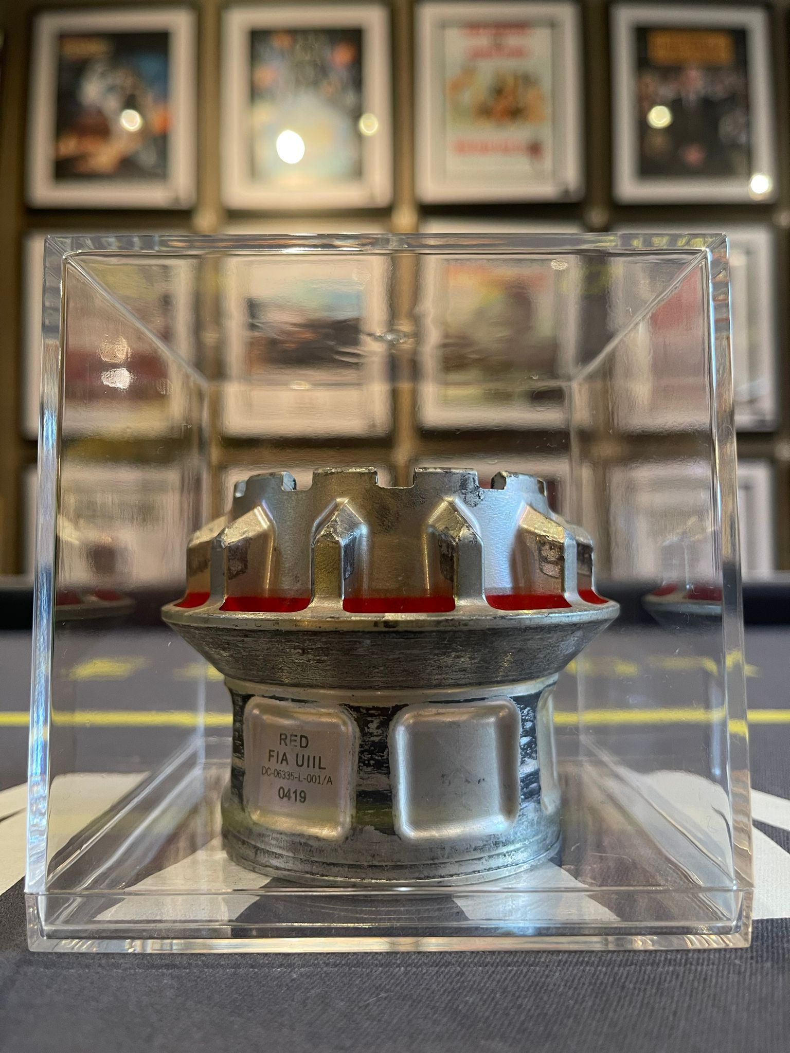 Race Used F1 Wheel Nut in Display Case - The Man Cave Broadway