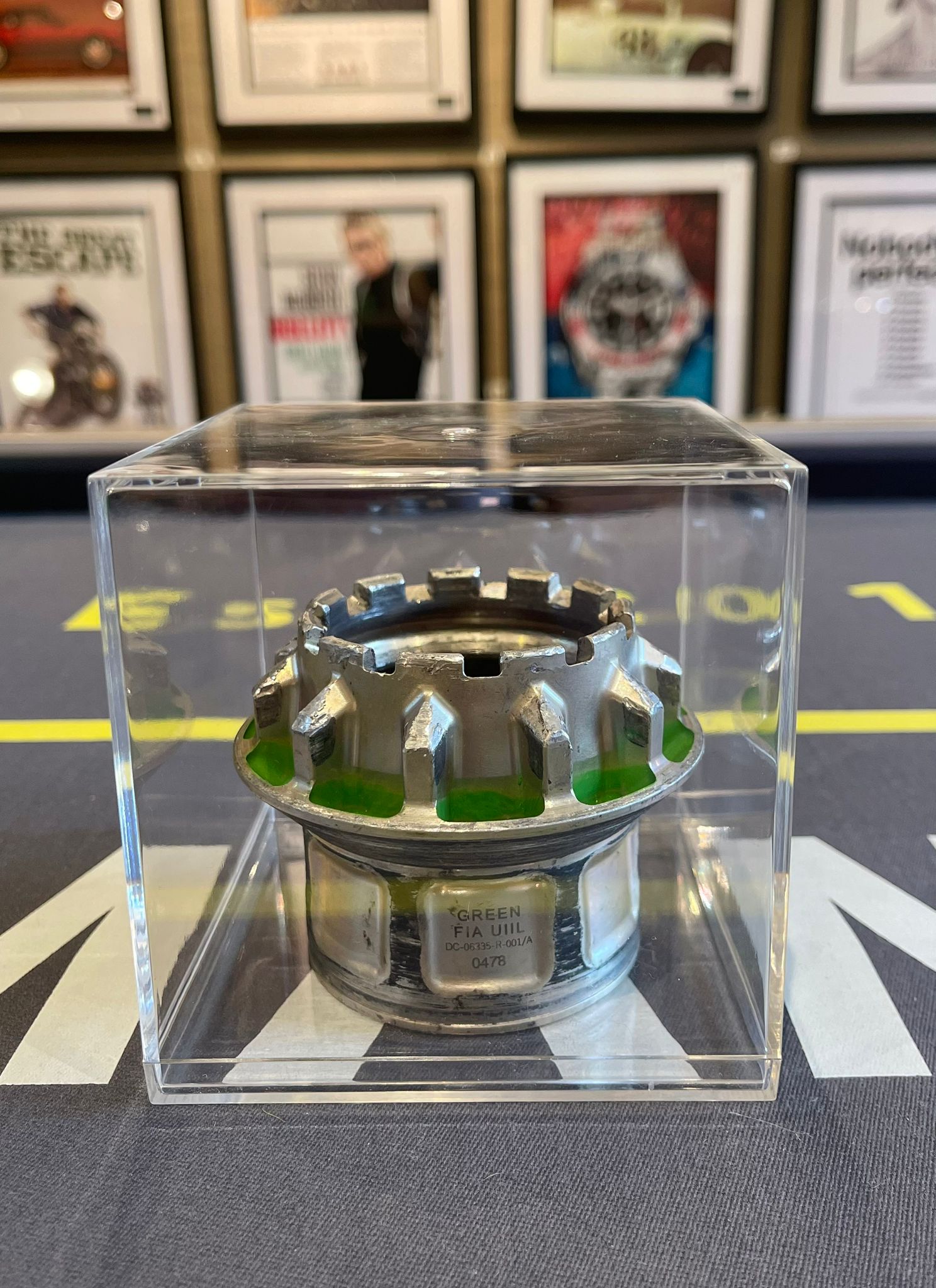Race Used F1 Wheel Nut in Display Case - The Man Cave Broadway